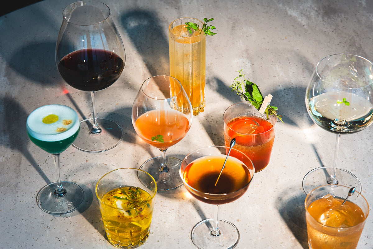 Cocktails on a sunlit travertine bar (photo: Szymon Shields / Pexels)